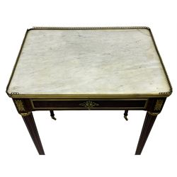 Late 19th century French figured plum pudding mahogany side table, canted rectangular white marble top with raised gilt metal gallery, fitted with a single frieze drawer, central extending floral cast ormolu escutcheon and applied moulded edging, on tapering turned and fluted supports with brass cups and castors, decorated with cast foliate mounts and foliate cast collars 