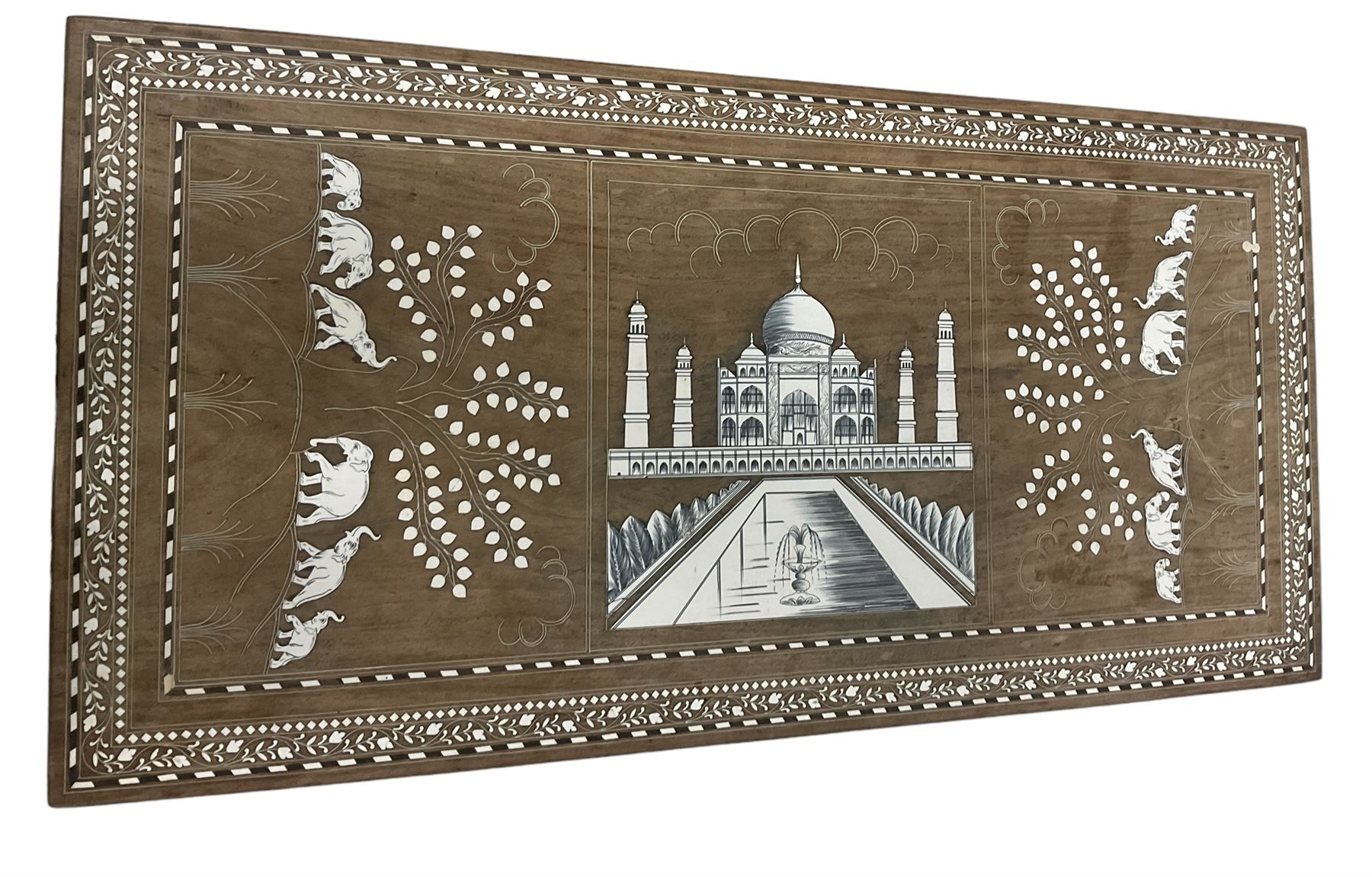 20th century Indian inlaid hardwood coffee table, rectangular top decorated with simulated ivory inlays depicting the Taj Mahal and elephants