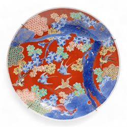 Japanese Meiji wall charger, decorated in the imari palette with swallows amongst blossoming branches and clouds, D41cm, together with various modern oriental figures including a Tang style horse, deity etc (7)