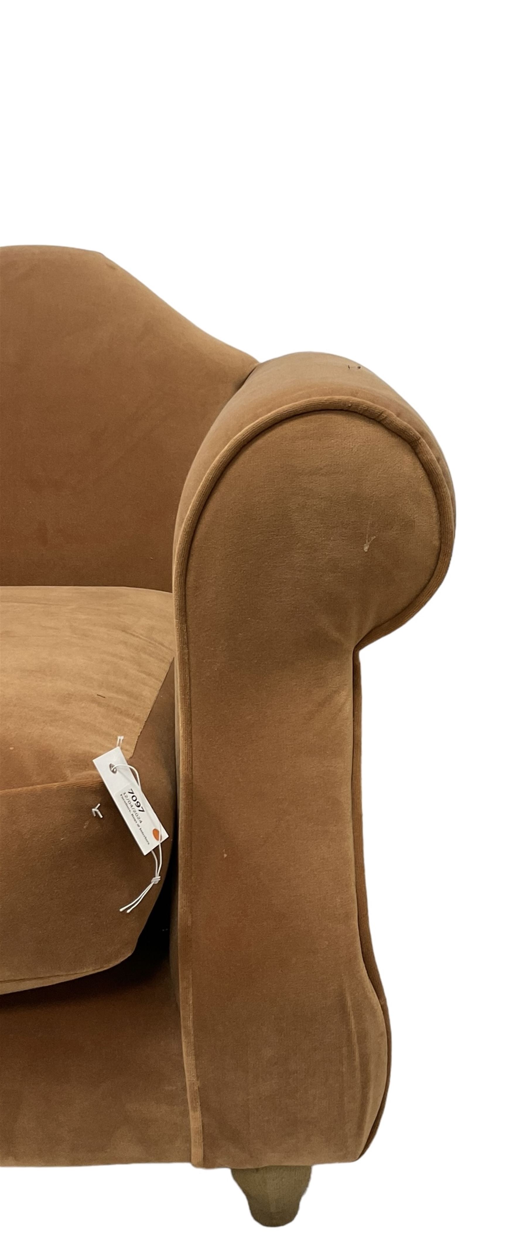 Loaf - hardwood-framed armchair, camelback and rolled arms, upholstered in rust velvet fabric, on turned oak front feet