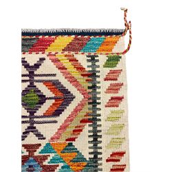 Chobi Kilim rug, pale ground and decorated with multi-coloured geometric pattern 