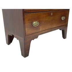 George III mahogany chest, rectangular ebony strung top, fitted with three graduating cock-beaded drawers with oval pressed brass handle plates and demi-lune handles, on tall bracket feet 