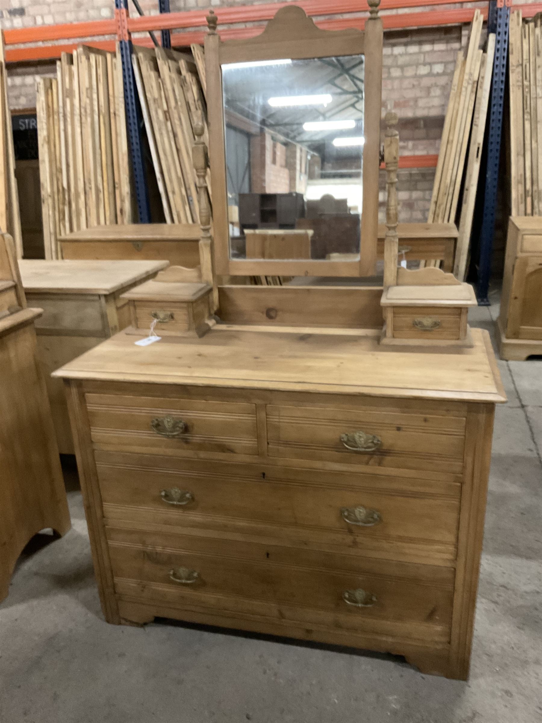 Edwardian pine dressing chest, raised back with rectangular swing mirror over trinket drawers, fitted with two short over two long drawers with Art Nouveau brass handles and carved rails - THIS LOT IS TO BE COLLECTED BY APPOINTMENT FROM THE OLD BUFFER DEPOT, MELBOURNE PLACE, SOWERBY, THIRSK, YO7 1QY