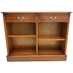 Georgian design yew wood open bookcase, rectangular moulded top over two drawers and two adjustable shelves, on moulded plinth base 