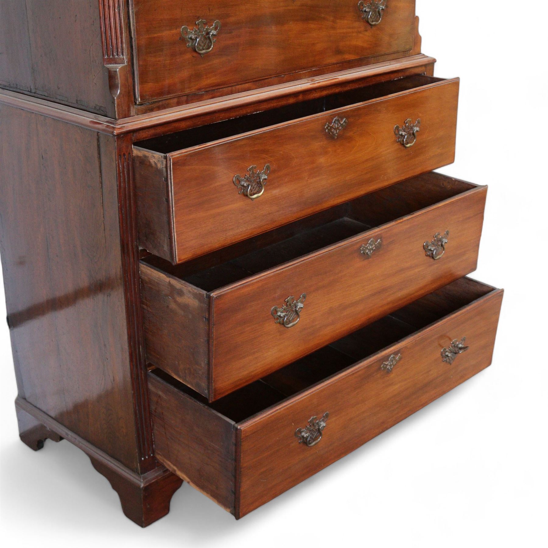 George III mahogany chest-on-chest, projecting moulded cornice, fitted with three short over six long graduating drawers, on bracket feet