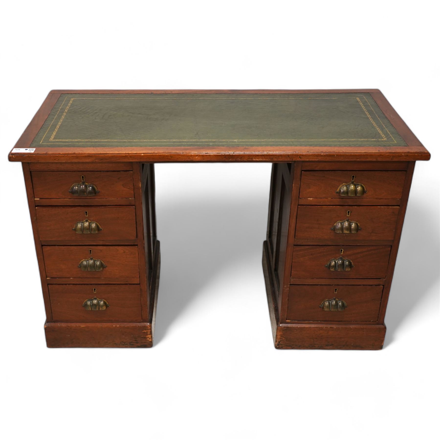 Early 20th century walnut twin pedestal desk, moulded rectangular top with inset green leather writing surface, fitted with eight drawers with brass cup handles, on plinth base