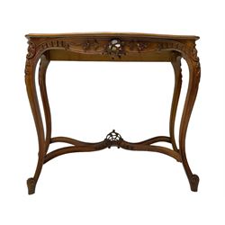 French design walnut console table, shaped top with inset grey marble panel, the frieze pierced and carved with scrolling foliage and applied flower heads, raised on cabriole supports with cartouche carved knees, united by shaped X-stretcher