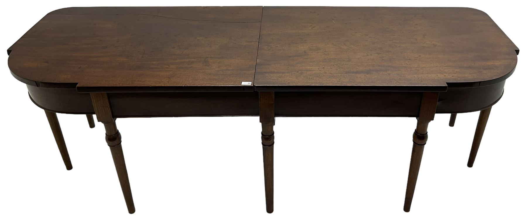 George III mahogany serving table, bow shaped top with banded frieze, raised on turned tapering supports