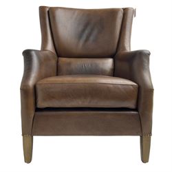 Club reading armchair, upholstered in brown Brazilian leather, studded detail, oak tapering legs