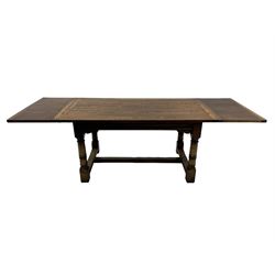 Oak refectory dining table, rectangular three plank top with cleated ends, two additional leaves, on turned supports united by H-stretchers 