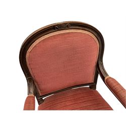 20th century French design mahogany fauteuil armchair, moulded and beaded framed, upholstered in pink fabric, rolled arms over acanthus leaf carved supports, on turned and fluted front supports united by curved X-framed stretcher 