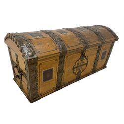 19th century painted oak sea chest, hinged dome top enclosing small compartment, bound by shaped and pressed metal strapwork, scumbled finish to resemble oak and painted with small vignettes depicting portraits and landscapes within panels, fitted with large wrought metal carrying handles, the front inscribed 'H.J.S. 1870' 