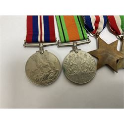 WWII group of six medals comprising 1939-45 Star, The Africa Star, The Italy Star, France and Germany Star, Defence Medal and War Medal 1939-45, awarded to 7899181 RAC C.W Hughes, together with two chevrons and ephemera relating to Charles William 'Bill' Hughes including Soldier's Release Book, photographs, certificates of transfers etc 