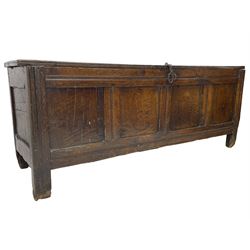 17th century panelled oak blanket chest or kist, quadruple panelled hinged lid over quadruple panelled front, moulded frame and pegged construction, on stile supports