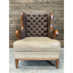 Walnut finish framed wing back armchair upholstered leather and buttoned fabric