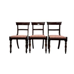 Set of six Victorian mahogany dining chairs, curved bar back over drop-in seat upholstered in striped fabric, on turned front supports