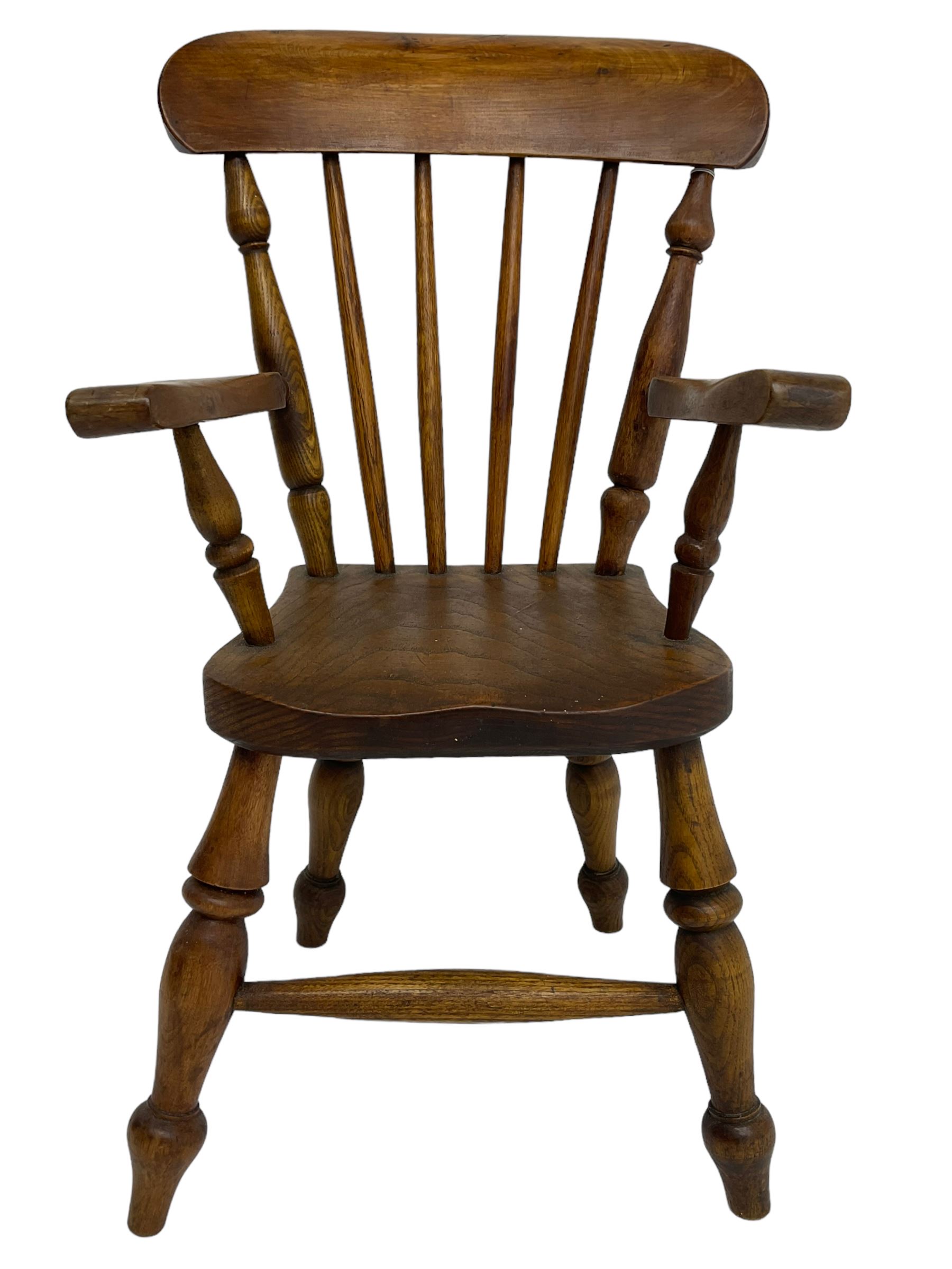 19th century elm and beech child's farmhouse chair, shaped cresting rail over stick back, on turned supports 