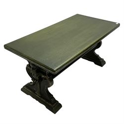 Italian design coffee table in green marbled finish, moulded rectangular top over shaped end supports mounted by putti caryatids and scrolls, stepped and moulded sledge feet