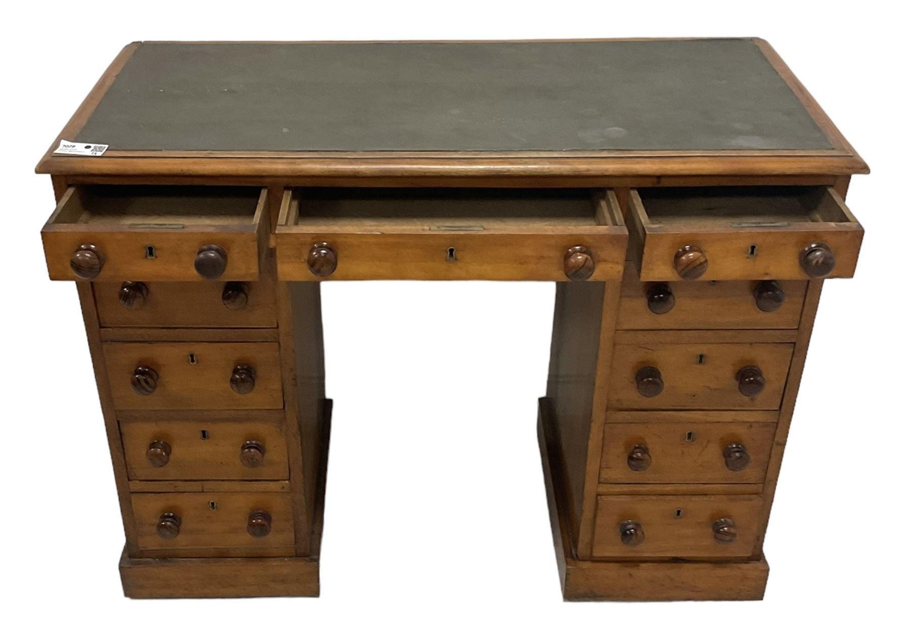 Victorian mahogany twin pedestal desk, rectangular top with inset green leather writing surface, fitted with central frieze drawer flanked by five graduating drawers on each side 