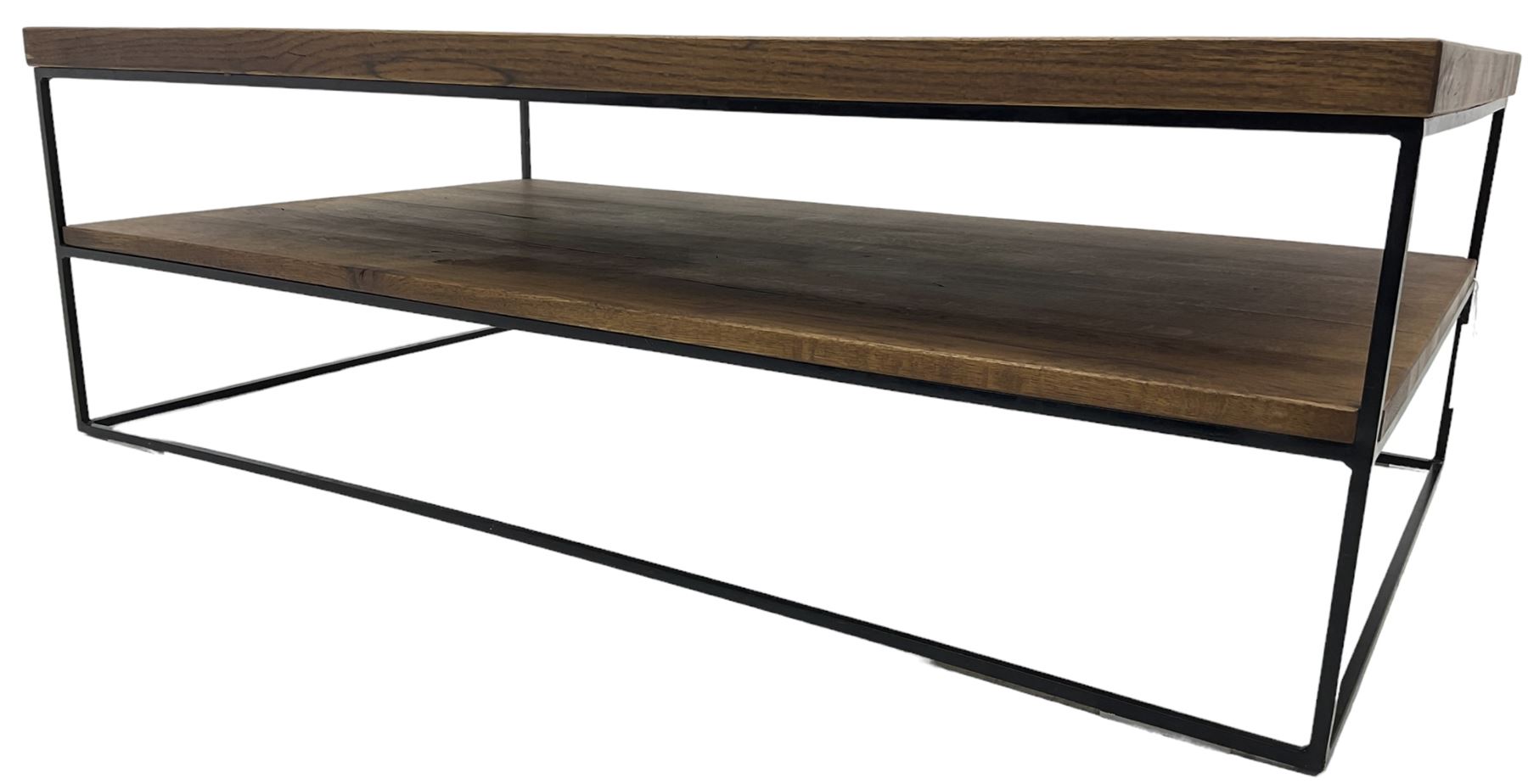 Samba oak coffee table, rectangular top over undertier storage, applied mid-tone finish, supported by black metal frame