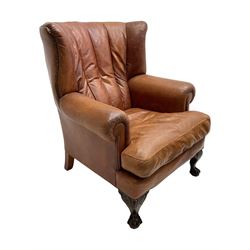 Tetrad - 'Blake' club armchair, fanned wingback and rolled arms upholstered in tan brown leather, on ball and claw carved cabriole feet 