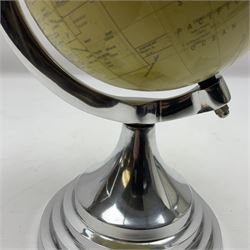 Art Deco style world globe with chrome aeroplane finial and mounts, H31cm