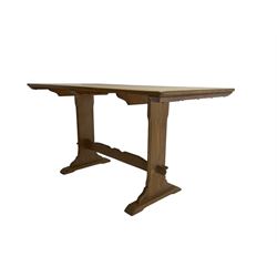 Mid-20th century rectangular oak dining table, shaped solid end supports joined by stretcher on sledge feet 