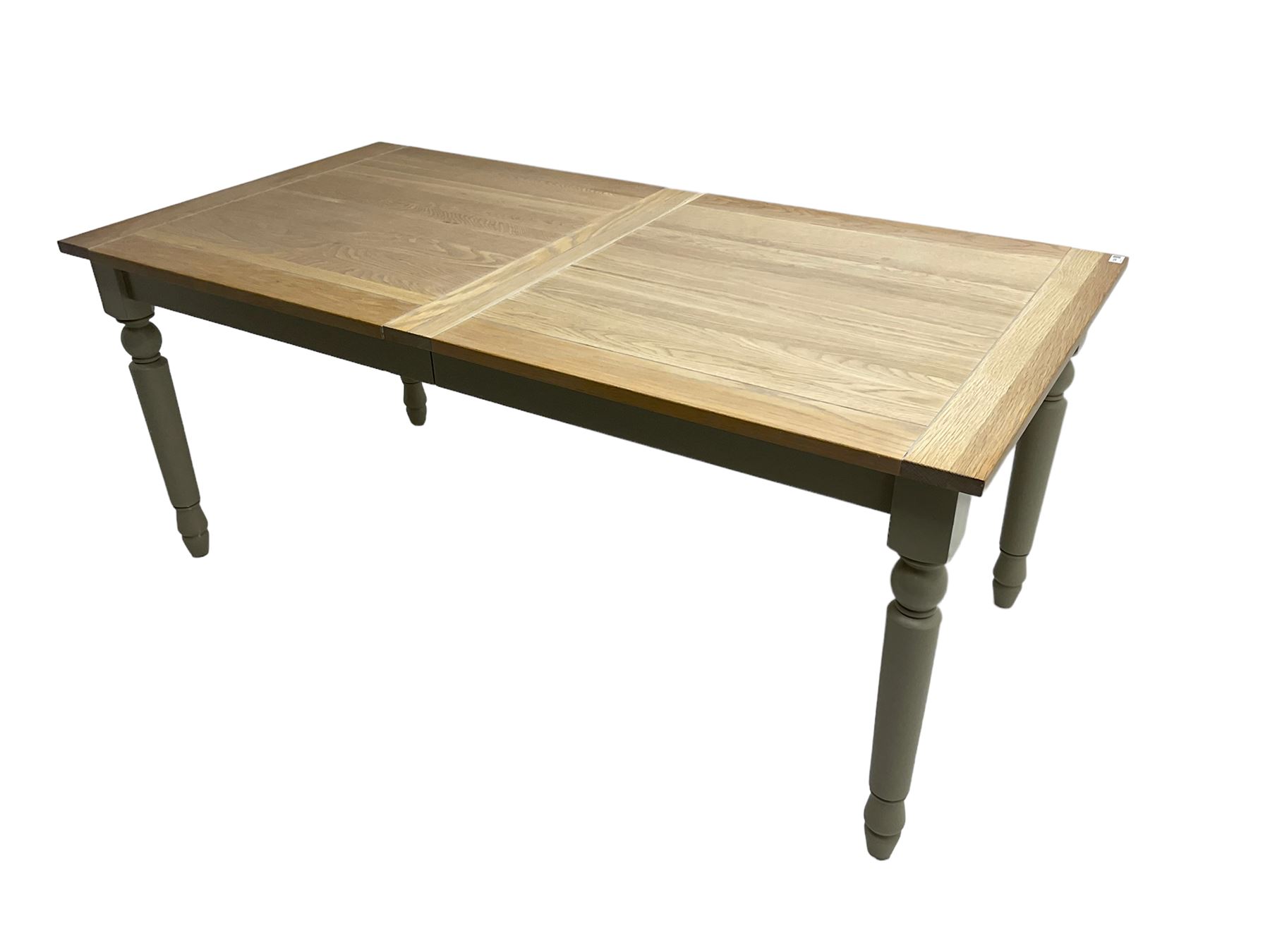 Neptune - 'Suffolk' 8-12 seat extending dining table, rectangular oak with breadboarded ends, on light grey finish base with turned supports, three additional leaves