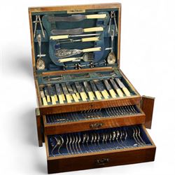 Wellington type oak canteen of silver plated cutlery, by J H Potter, Sheffield for twelve covers, including carving set, nut crackers, ladles, berry spoons, jam spoons, egg spoons, salt spoons, serving and dining cutlery, ivorine handles (incomplete)