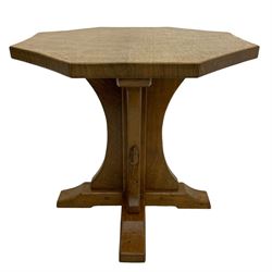 Mouseman - occasional table, adzed octagonal top, cruciform base on sledge feet, carved with mouse signature, by the workshop of Robert Thompson, Kilburn 