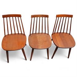 Set of three mid-20th century Swedish teak stick-back chairs, raised on tapering supports