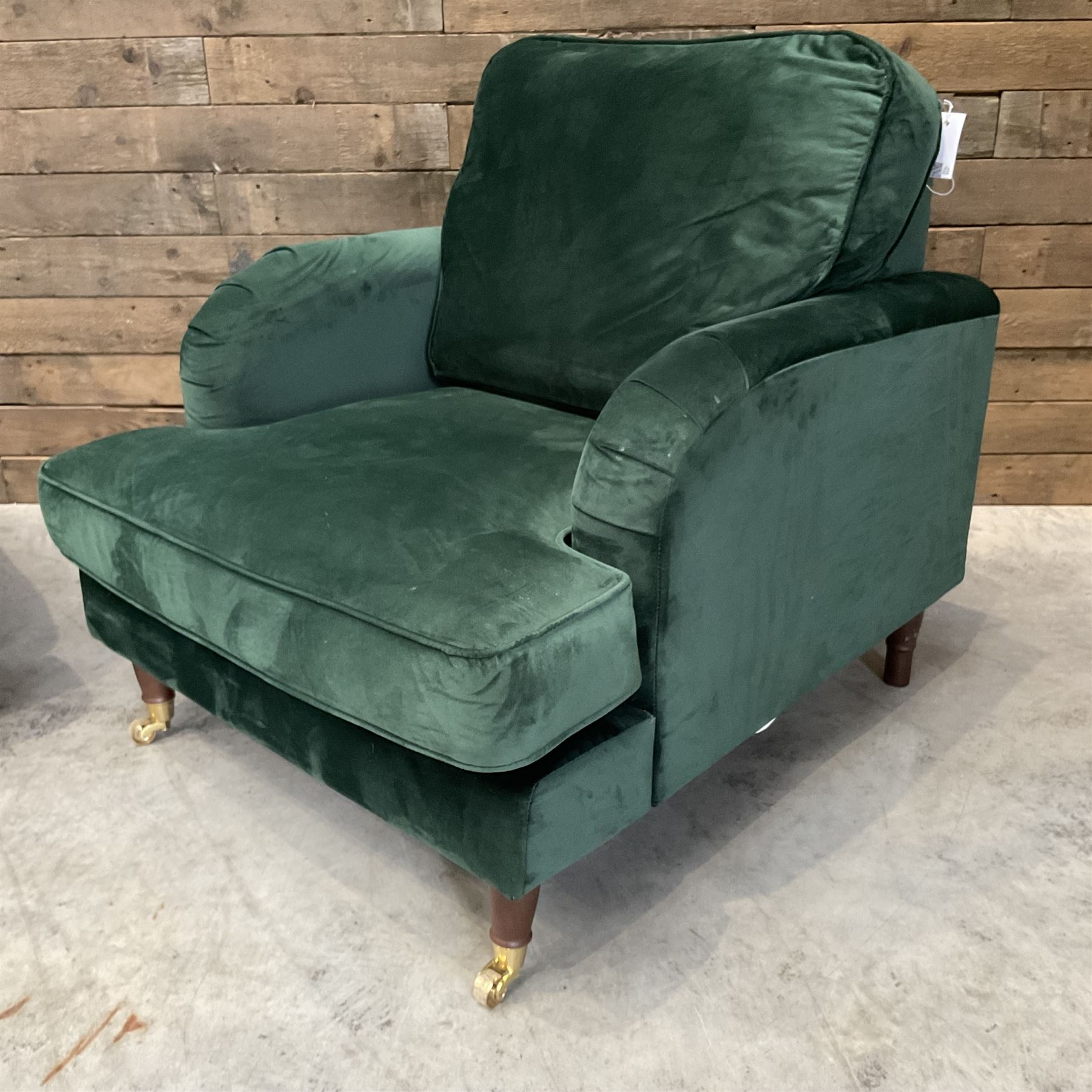 Pair of Howard design armchairs, upholstered in jade green velvet fabric