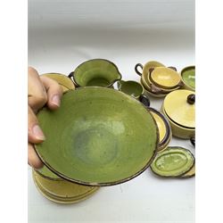 French green and yellow glazed tea and dinner wares by Etienne Noel, including milk jugs, teacups, side plates, bowls etc (43)