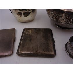 Group of silver, comprising milk jug, miniature trophy, napkin rings and cigarette cases, all hallmarked together with a continental silver bowl with pierced sides, jug H10cm