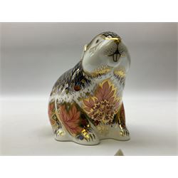 Three Royal Crown Derby paperweights, Puppy, with gold stopper, Riverbank Beaver, limited edition 3007/5000, with gold stopper and Misty, with gold stopper and original box, all with printed mark beneath 