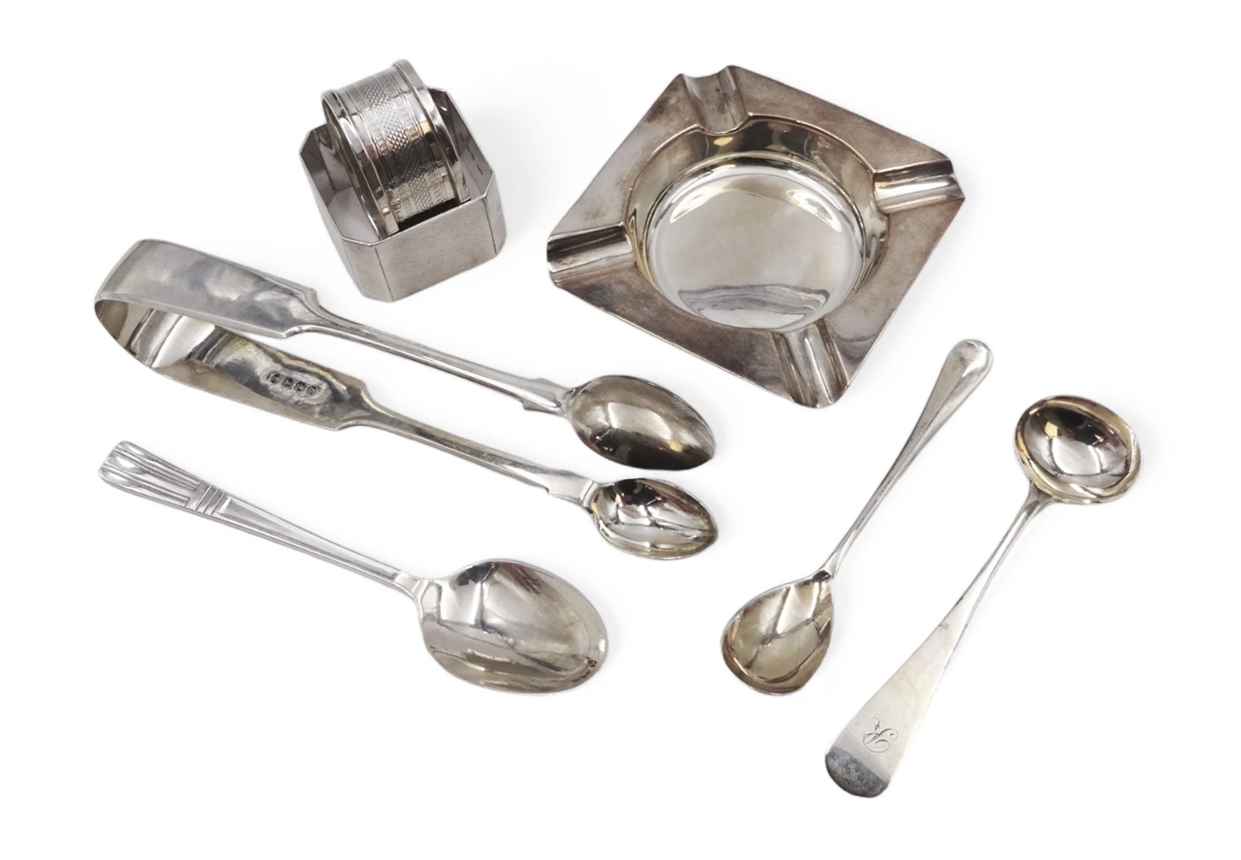 Group of silver, comprising ashtray, two napkin rings, sugar tongs and spoons, all hallmarked 