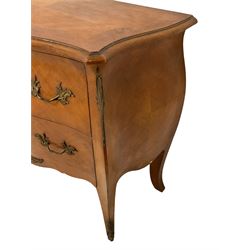 Late 20th century French design walnut bombe chest, shaped moulded top with quarter-matched veneers within crossbanding, fitted with two drawers with foliate cast metal handles and escutcheons, on tapering supports with ornate cast caps 