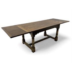 Oak refectory dining table, rectangular three plank top with cleated ends, two additional leaves, on turned supports united by H-stretchers 