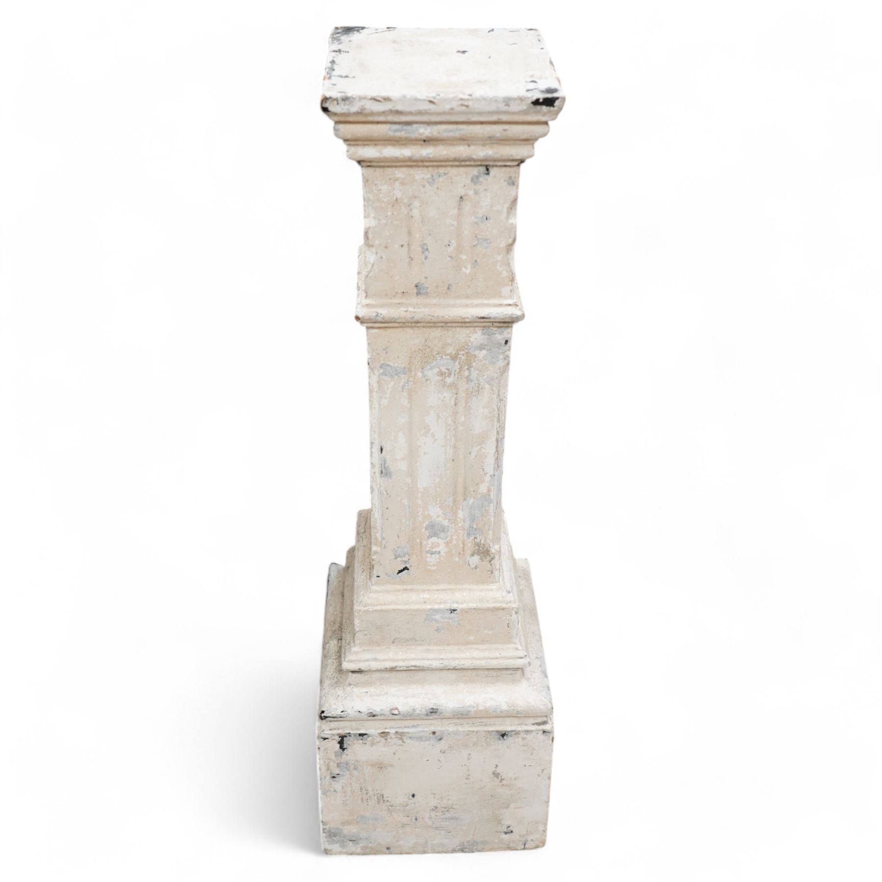 20th century painted wood pedestal, stepped square form with fluted decoration, terminating to moulded base, distressed white paint finish 