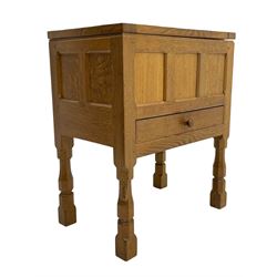 Mouseman - oak work or sewing box, rectangular adzed top inscribed 'L. M. C. 1976' enclosing vacant interior, triple panelled front and double panelled sides, fitted with single drawer, on octagonal supports, carved with mouse signature, by the workshop of Robert Thompson, Kilburn 