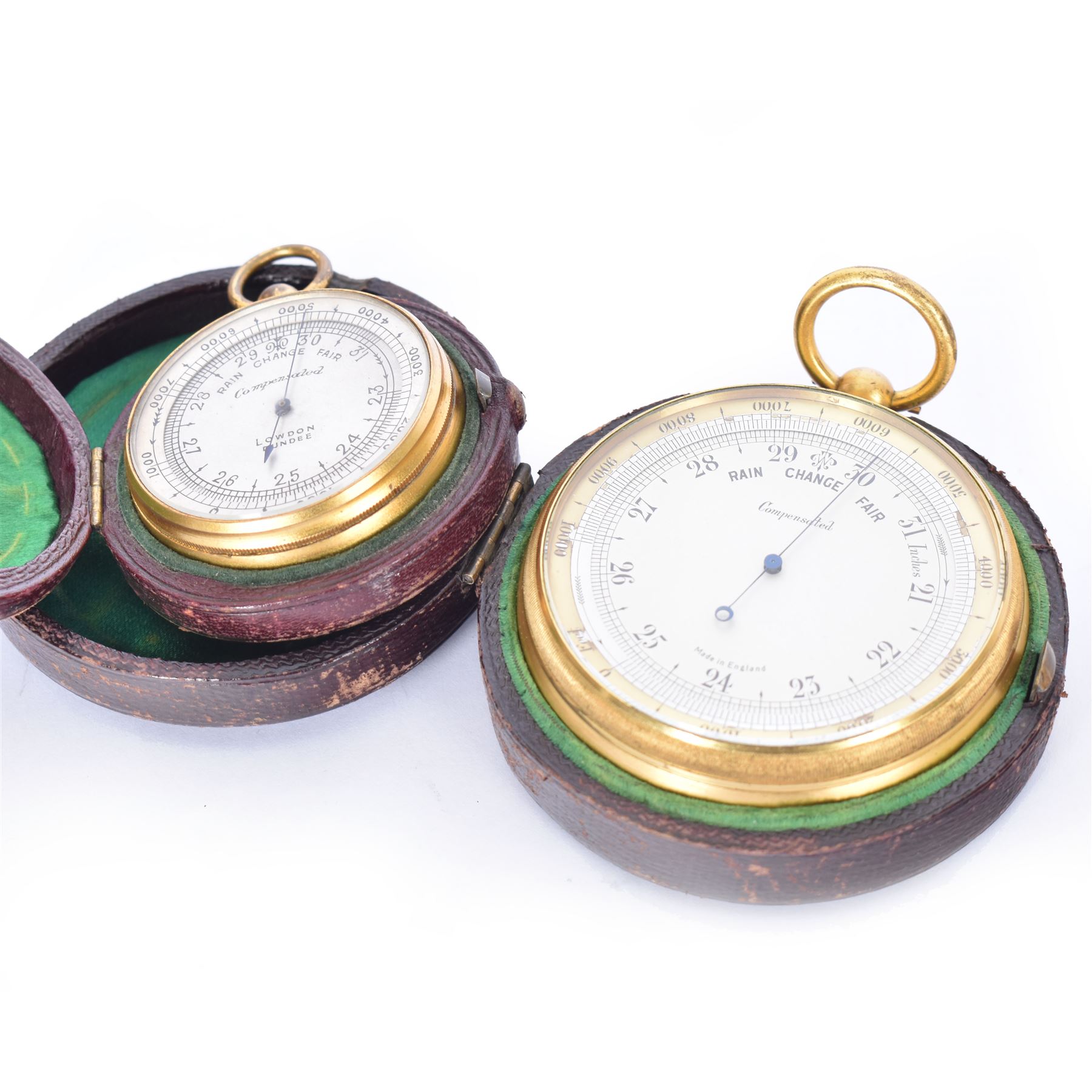 Lowdon Dundee, an early 20th century leather cased pocket barometer with silver dial, D4cm, together with another larger and later example, both cased