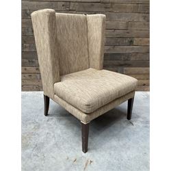 High wing back armchair, upholstered in oatmeal fabric