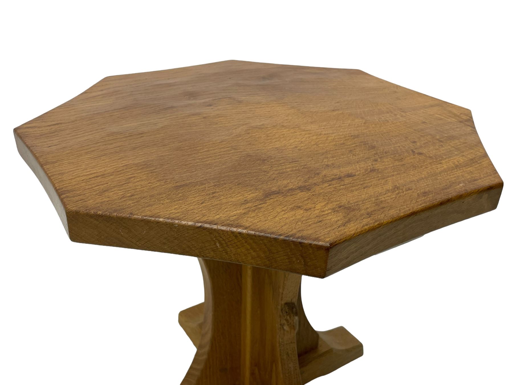 Mouseman - oak occasional table, octagonal adzed top, cruciform pedestal on sledge feet, carved with mouse signature, by the workshop of Robert Thompson, Kilburn 