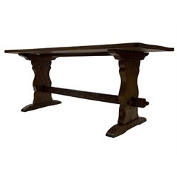 Gnomeman - oak dining table, rectangular adzed top, shaped end supports on sledge feet united by pegged stretcher, by Thomas Whittaker, Littlebeck, Whitby 