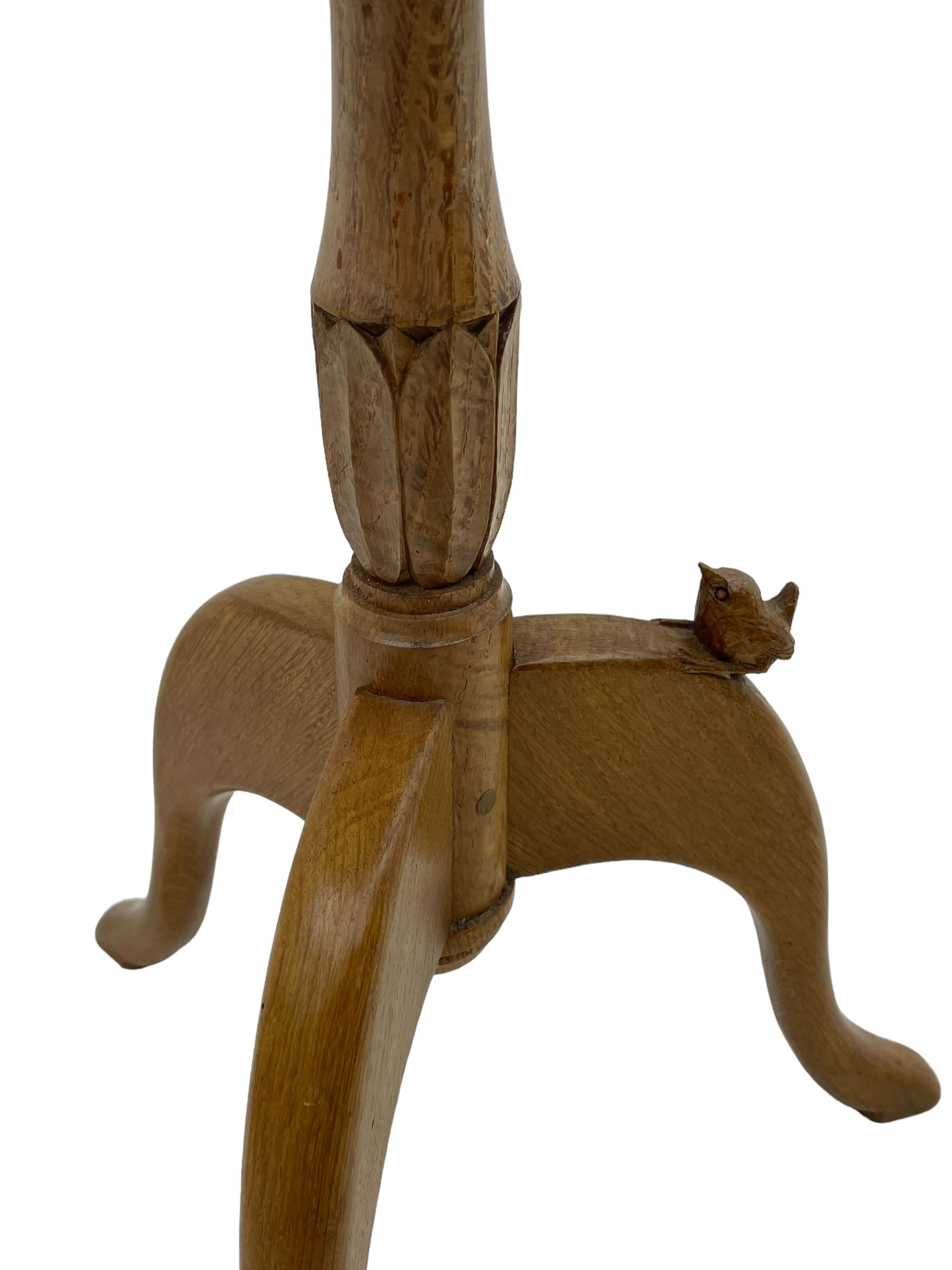 Wrenman - oak tripod wine table, circular moulded top on turned stem carved with leaves, on three shaped splayed supports, carved with wren signature, by Robert 'Bob' Hunter, Thirlby, Thirsk