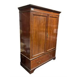 Edwardian inlaid mahogany double wardrobe, panelled doors enclosing sliding trays and hanging rail, fitted with single drawer to base