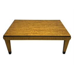 Art Deco design maple wood coffee table, rectangular top with reeded edge, on tapered supports with metal feet protectors