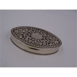 Edwardian silver trinket box, of navette form, the hinged cover with pierced floral and foliate decoration, and blank cartouche, hallmarked George Nathan & Ridley Hayes, Birmingham 1915 and stamped to base Pearce & Sons Silversmiths Leeds & York, W15.5cm, H3.5cm, 