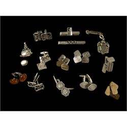 Collection of predominantly silver cufflinks and tie clips, including Scandinavian cufflin...