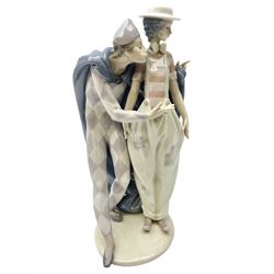 Lladro Carnival Companions, modelled as a male and female clown, with original box, no 6195, year issued 1995, year retired 1998, H31cm